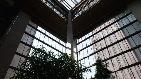 Building with trees at high floor, quarter angle tilt Stock Footage 110178386