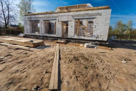 The building under construction and materials for construction Stock Photos