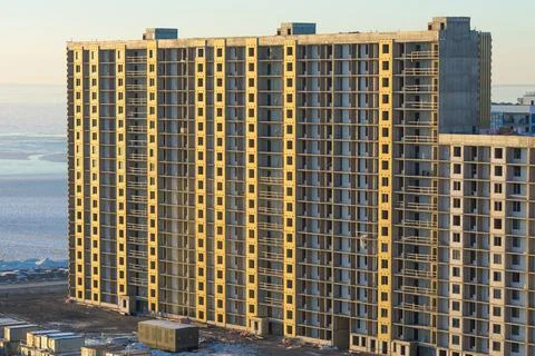 Building under construction. Construction site. Urban. Multistory. High-rise  Stock Photos