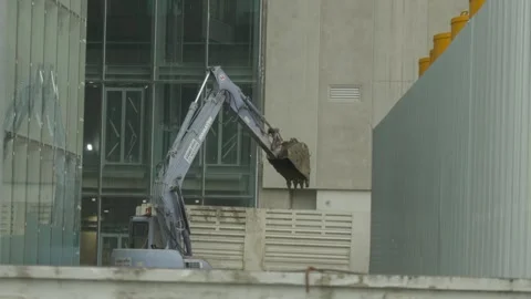 Building under construction with an excavator Stock Footage 247114480