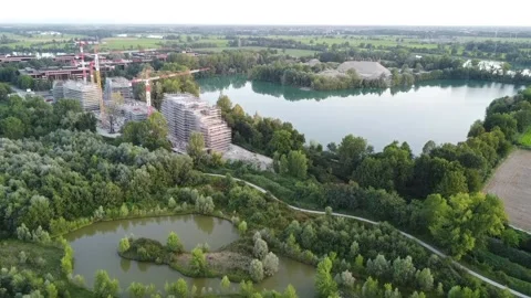 Building under construction in front of the quarry (Milano 3) 1 Video stock 247775755