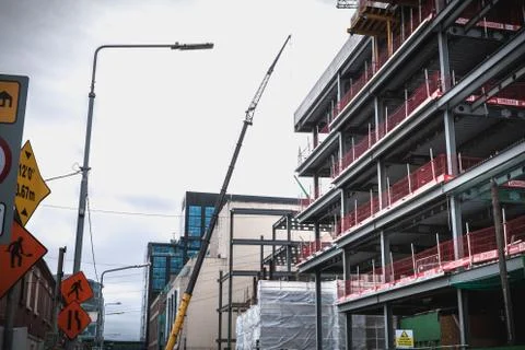 Building under construction in the new high tech district Downtown Docks of d Stock Photos