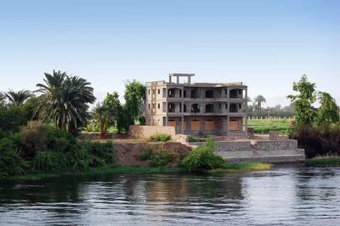 Building under construction on the Nile river shore. Southern Egypt, Africa. Stock Photos