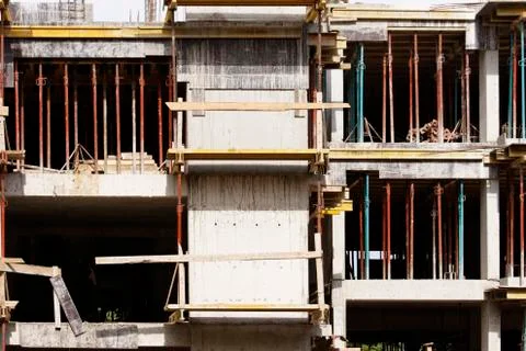Building under construction with scaffolding Stock Photos