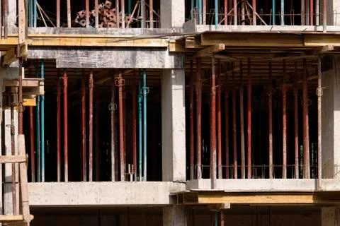 Building under construction with scaffolding Stock Photos