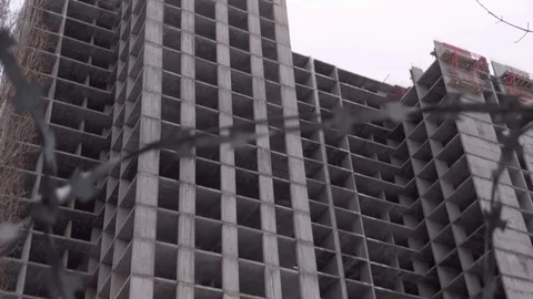 Building under construction in snowfall Stock Footage 129521678