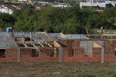 A building under construction with trees in the background Stock Photos