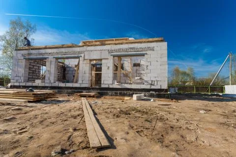 The building under construction, workers and materials for construction Stock Photos