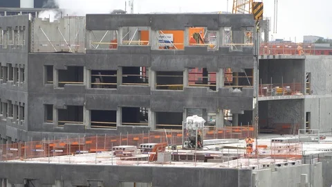 Building under construction with workers. Copenhagen, Denmark 01.12.2019 Stockbeeldmateriaal 121853734