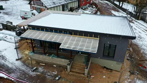 Building under development in winter, residential construction site in aerial Vídeos de archivo 331228312