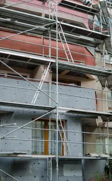 Building under reconstruction. wall insulation. metal structures for repair a Stock Photos