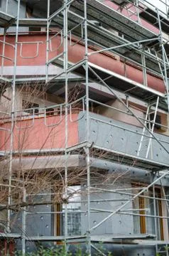 Building under reconstruction. wall insulation. metal structures for repair a Stock Photos