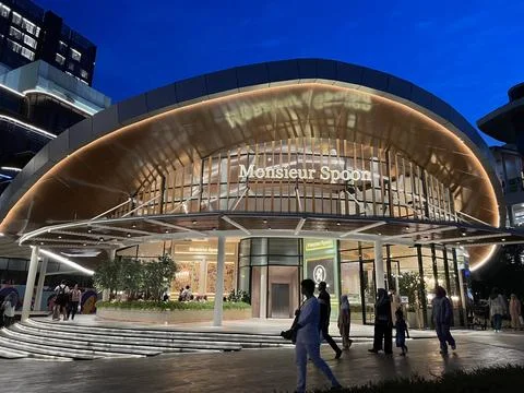 Building with a unique roof shape with decorative lights Stock Photos