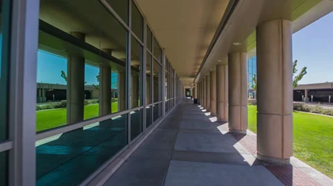 Building walking through hallway with window reflections Stock Footage 31741073