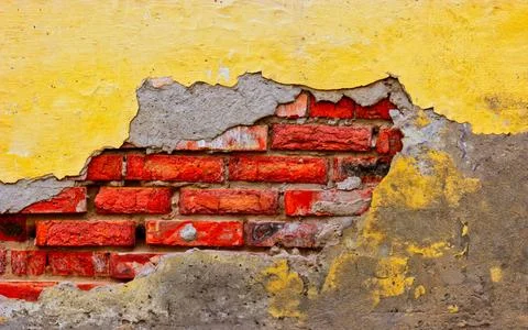 Building wall with half broken palster Worn Building wall with half broken... Stock Photos