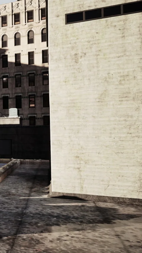 Building wall with shadows and light in an urban setting during the day Stock Footage 339106111
