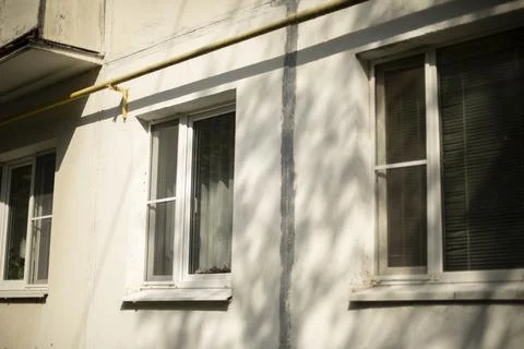 Building with windows. Urban development. Lots of apartment building. Stock Photos