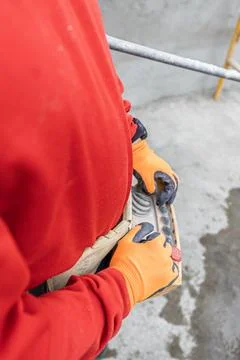A building worker using a remote control 스톡 사진