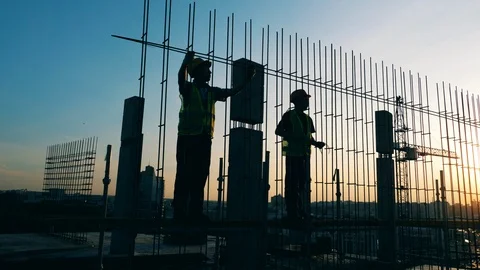 Building workers are constructing a metal framework Stock Footage 118573158