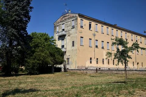 Building with worn facades seen from afar on a sunny day Stock Photos