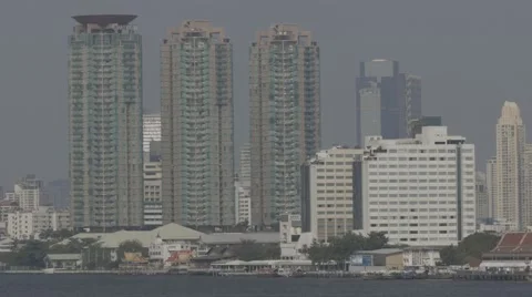 Buildings alongside the Chao Phraya River near Asiatique The Riverfront Stock Footage 48205978