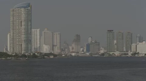 Buildings alongside the Chao Phraya River near Asiatique The Riverfront Stock Footage 48206062