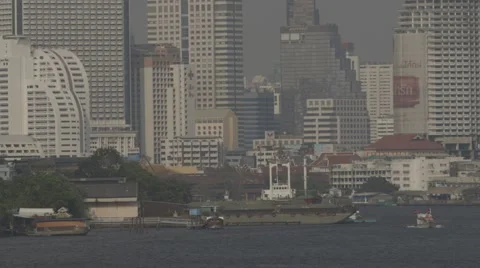 Buildings alongside the Chao Phraya River near Asiatique The Riverfront Stock Footage 48206377
