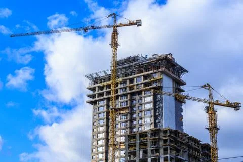 Buildings Construction site with crane Stock Photos