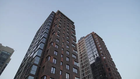 Buildings display angular shapes and glass surfaces Vídeos de archivo 326483165