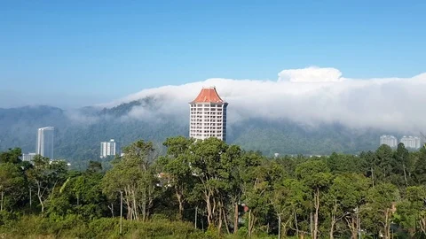 Buildings on the mountains with clouds Stock Footage 107506737