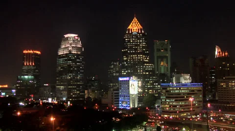 Buildings of Silom (CBD) District along Rama IV Road at Night Bangkok Stock Footage 38607989