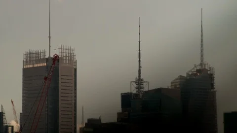 Buildings under construction on cloudy day with crane operating. Stock-Footage 106155369