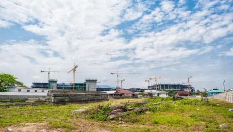 Buildings under construction with cranes Stock Photos