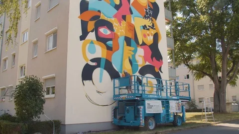 Buildings Wall Painted with Illustrations 스톡 동영상 113284114