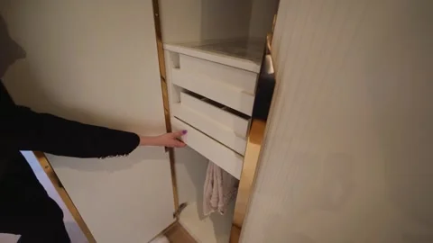 Built-In Closet Drawer with Hanging Sections for Easy Organization Stock Footage 322563834