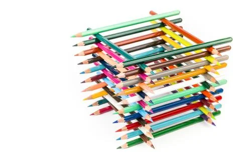 Built square construction of various colored crayons Foto stock