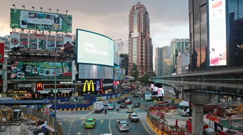 Bukit Bintang intersection rush in Kuala Lumpur Stock Footage