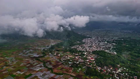 Bukit Selong region with rice fields and village under cloud cover in Bali Stock Footage 306667166