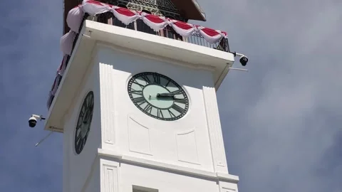 BUKITTINGGI, INDONESIA - AUGUST 11, 2026 Slow Drone Orbit Around Jam Gadang Stock Footage 343198632