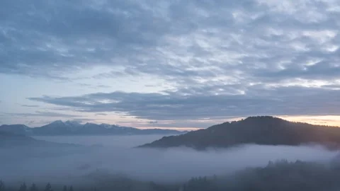 Bukov Vrh Elevated time lapse of low inversion fog moving in the valley Stock Footage 258107675