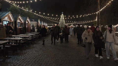 Bukovel, Ukraine, 08 Dec 2024. Slow motion. New Year's lights on the street. Stock Footage 295217497