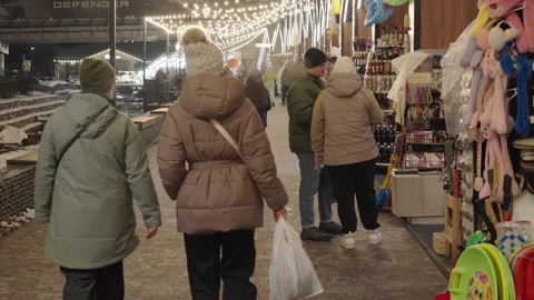 Bukovel, Ukraine, 08 Dec 2024. Slow motion. New Year's lights on the street. Stock Footage 295217522