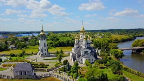 BUKY, UKRAINE - August 2020: Landscape Park, Church of St. Eugene, Aerial view. Stock Footage 145479341