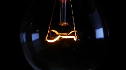 Bulb on a black background closeup Stock Footage 37422903