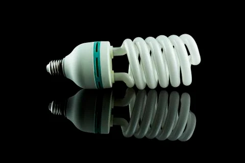 Bulb on black background Stock Photos