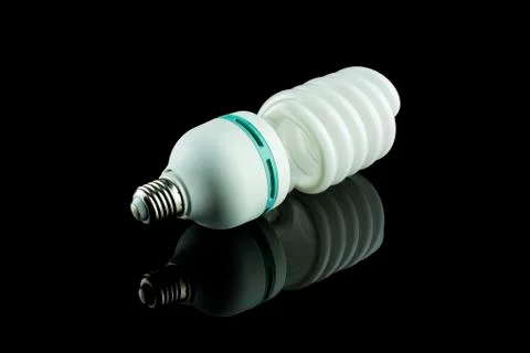Bulb on black background Stock Photos