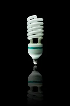 Bulb on black background Stock Photos