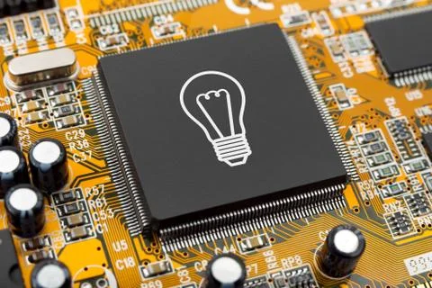 Bulb on computer chip 스톡 사진