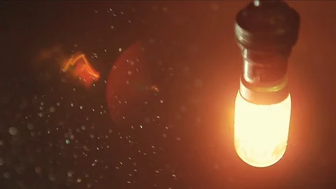 Bulb dust wind dark background hd footage nobodyoldlamp Stock Footage 110694486