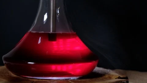 The bulb is filled with Shisha smoke Stock Footage 124969833